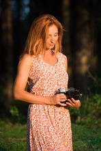 Hot redhead Michelle H wanders through lush countryside with her camera 01